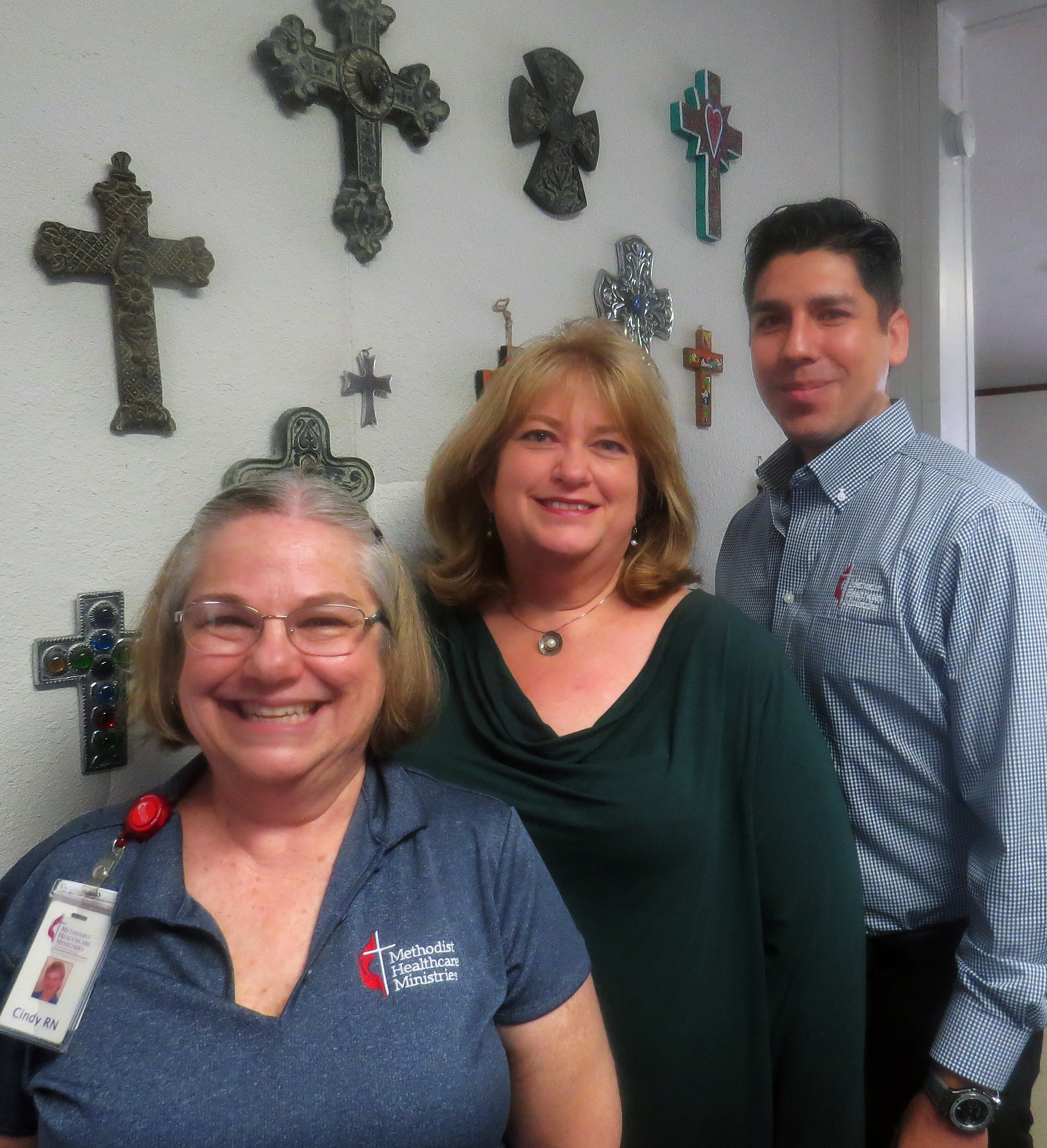 Cindy Bishop (left) stands with the Rev. Michelle Vernone and Robert Chapa. Vernone is pastor of First United Methodist Church in Edinburg, Texas. Bishop and Chapa are based there and work for Methodist Healthcare Ministries of South Texas. Bishop is a Wesley Nurse, doing public health outreach, and Chapa is a counselor. Photo by Sam Hodges, UMNS.