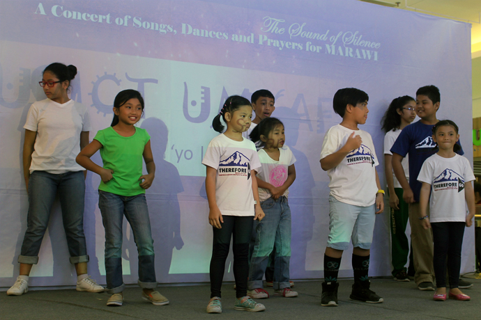Children of members of the United Methodist Young Adult Fellowship perform a dance during a concert Dec. 7 in Waltermart, Cabanatuan City, in support of Filipinos under siege in Marawi. The Sound of Silence Concert of Dances, Songs and Prayers for Marawi was sponsored by United Methodists in the Middle Philippines Conference to raise awareness about the five-month siege of Marawi City by pro-Islamic State forces. Photo by Gladys Mangiduyos, UMNS.