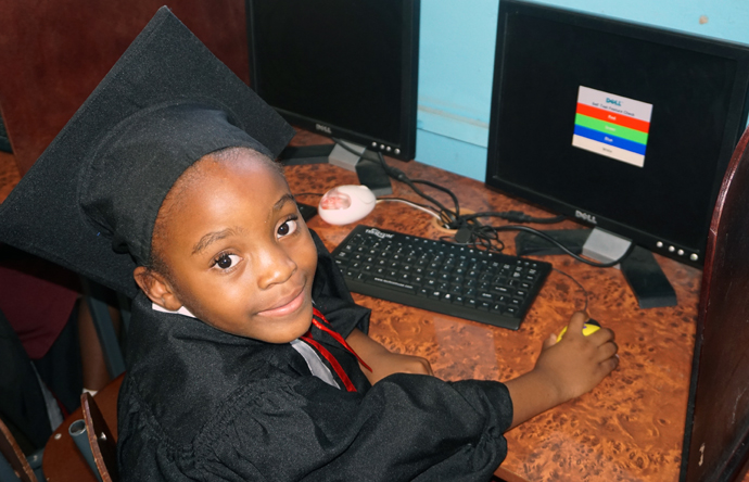 Six-year-old Charlene Ramaboea shows off her computer skills at the Murehwa Day Care Centre in Mashonaland East province, Zimbabwe. Photo by Kudzai Chingwe, UMNS.