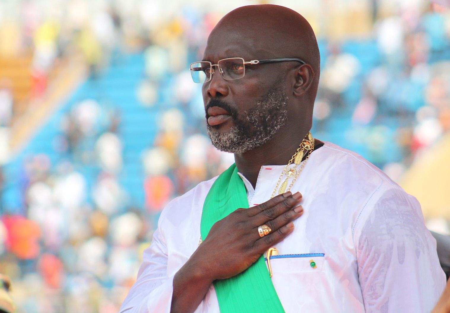 George Manneh Weah salutes during the playing of Liberia’s national anthem at his inauguration as the country’s 24th president at Samuel Doe stadium in Monrovia. Weah, a United Methodist and former soccer star, was elected by more than 61 percent of the vote. Photo by E Julu Swen, UMNS.