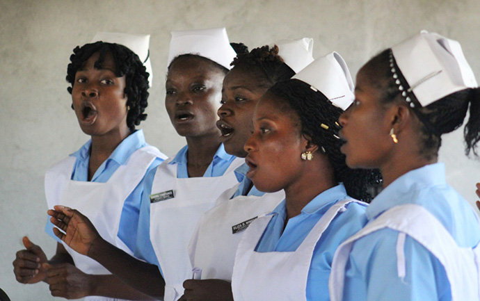United Methodist University nursing students sing during the consecration ceremony in Ganta, Liberia. Photo by E Julu Swen, UMNS. 