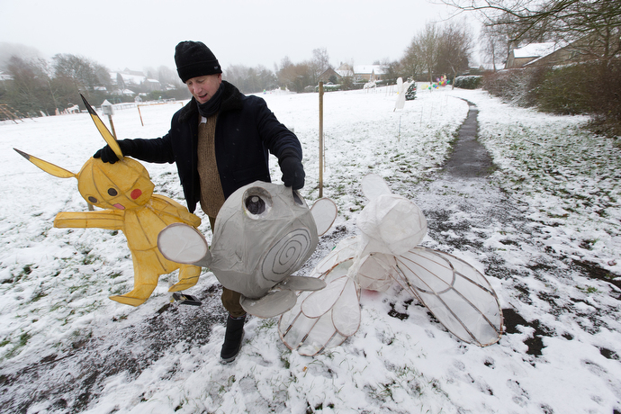 The Rev. Keith Sandow sets out Papier-mâché figures for the Lantern Parade hosted by the Kettleshulme Methodist Church in Northern England.