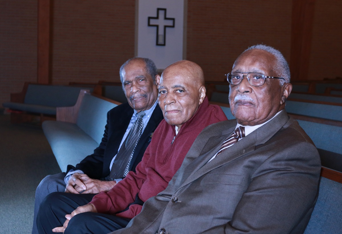 Drs. Robert Prince (left), Larry Lundy (center) and Claude Williams share a pew at Hamilton Park United Methodist Church in Dallas, where they are part of a weekly Bible study for seniors. All three were groundbreaking black doctors in Dallas — Prince in obstetrics, Lundy in podiatry and Williams in orthodontics. Photo by Wil Murphy, for North Texas Conference.
