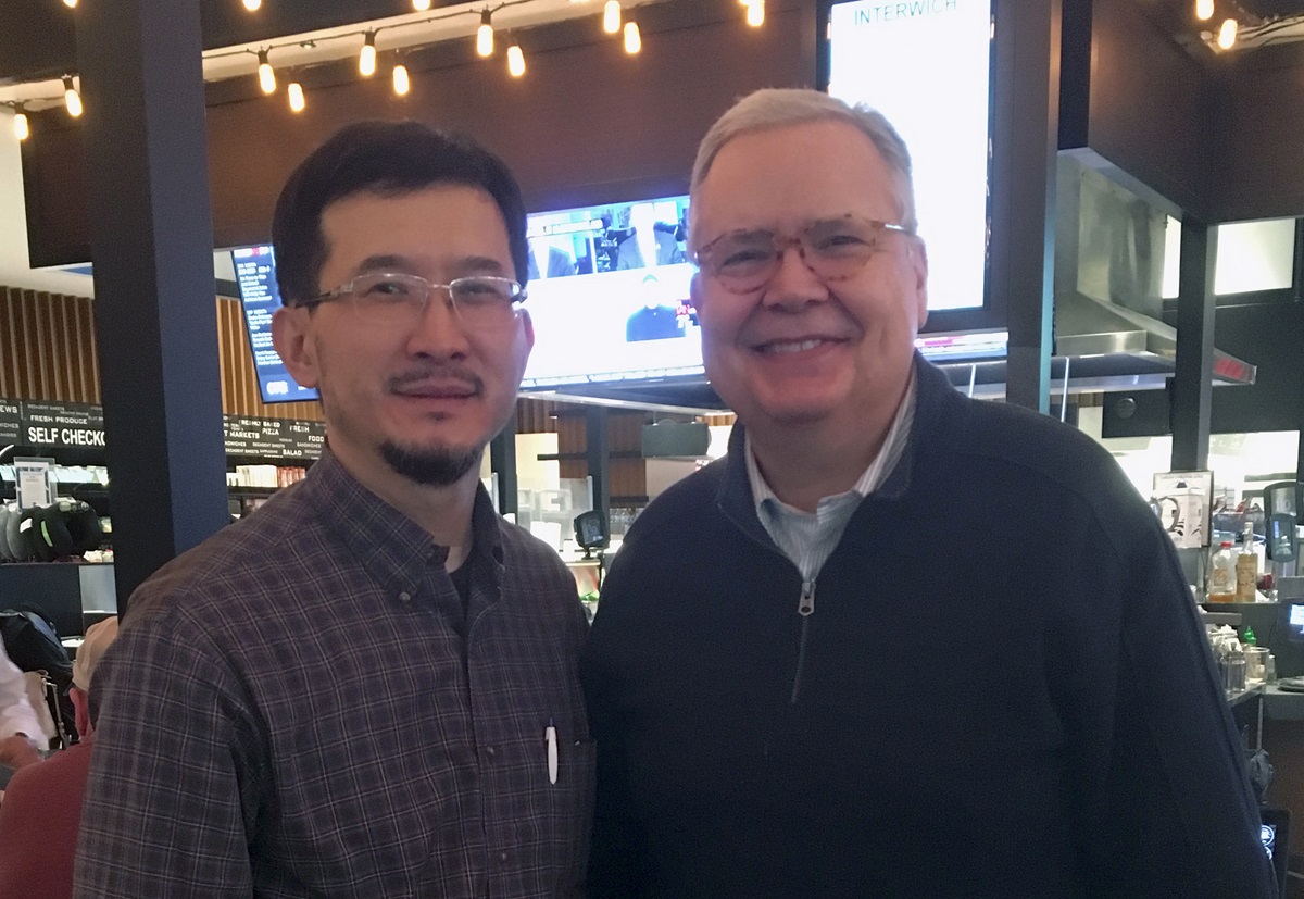 Eurasian Area Bishop Eduard Khegay (left) was without his wallet at New York's LaGuardia Airport when he got unexpected assistance from the Rev. John Wimmer, a United Methodist clergyman who noticed Khegay's bishop's lapel pin. Photo courtesy of the Rev. Wimmer.