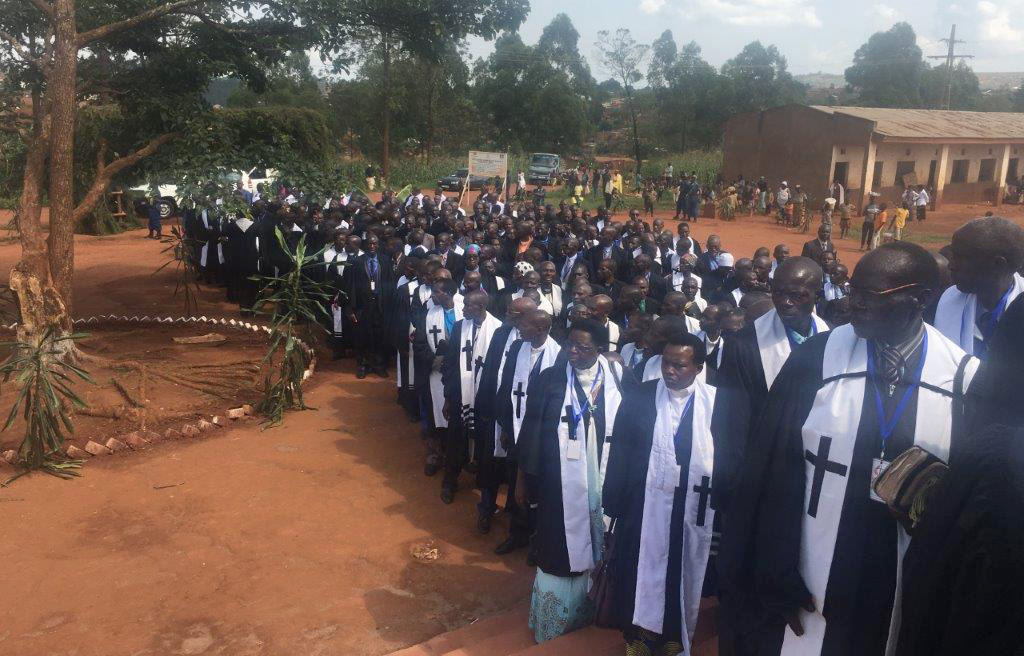 Clergy line up outside St. Peter's United Methodist Church in Gitega, Burundi, for a special Burundi Annual Conference session to celebrate unity within the church. Photo by Tafadzwa Mudambanuki, UMNS.