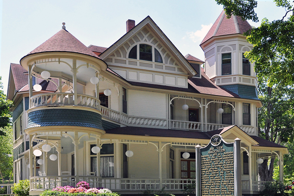 Evelyn Hall (1890), an outstanding example of Queen Anne architecture, is among the public buildings at Bay View, a United Methodist-affiliated summer community in northern Michigan.  Bay View is embroiled in a lawsuit overs its requirement that only practicing Christians can own a cottage there. Photo courtesy Bay View Chautauqua Inclusiveness Group.