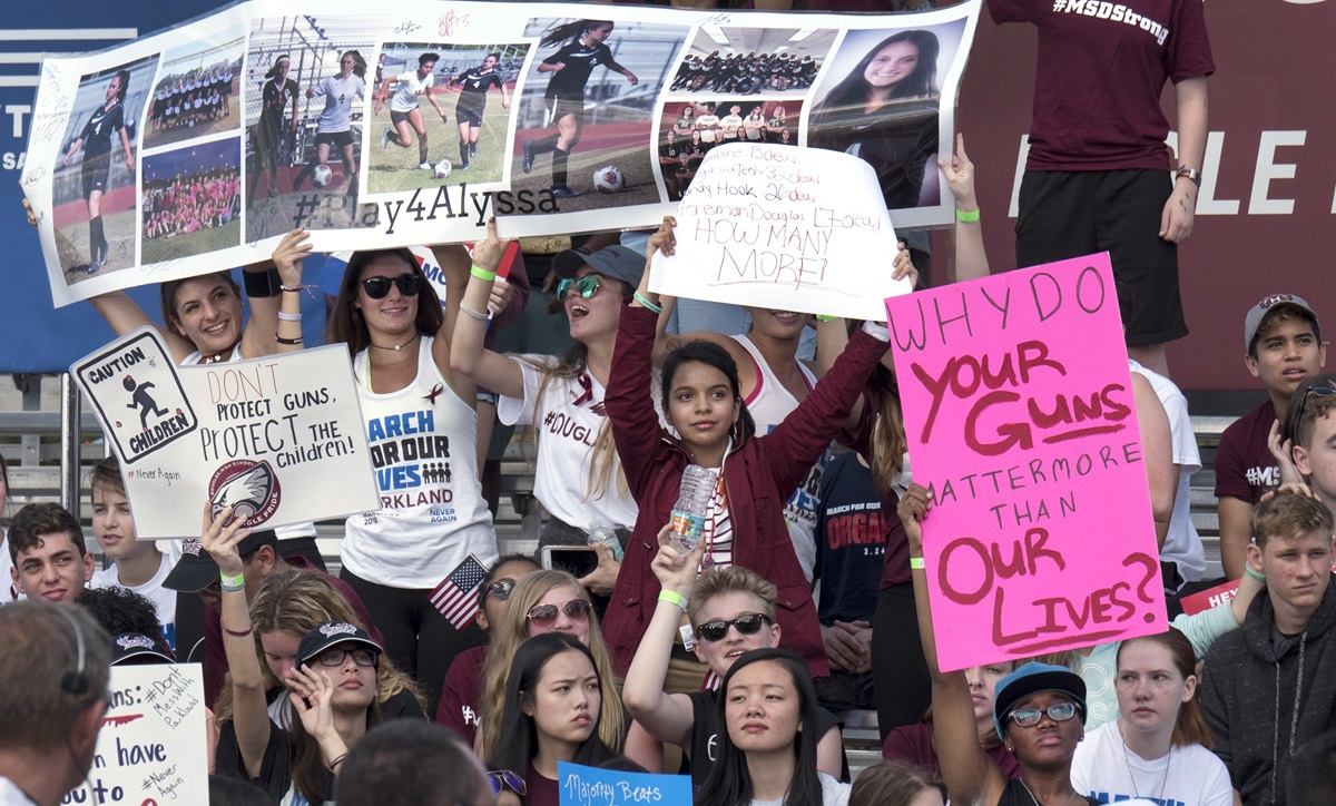 Students from Marjory Stoneman Douglas High School lined bleachers at a March for Our Lives rally held in Parkland, Fla., March 24. Adults have the power to change gun laws if they get out and vote, students emphasized. “Policy change is not as difficult as losing a loved one,” one student said. Photo by Kathy L. Gilbert, UMNS.