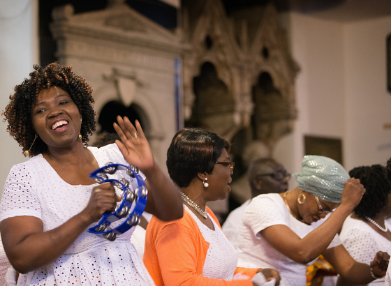 Harriet Appiah-Anderson (left) sings with the choir at Wesley's Chapel in London. She is chair of the church's Ghanaian fellowship. Photo by Kathy L. Gilbert, UMNS