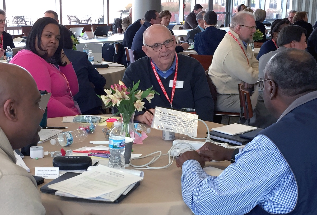 Dana Lyles of Western North Carolina Conference and the Rev. Brad Brady of the South Georgia Conference were among the Connectional Table members talking in small groups during the April meeting in Chicago. The 64-member church leadership body discussed how to carry out the church’s disciple-making mission in this time of uncertainty. Photo by Heather Hahn, UMNS.