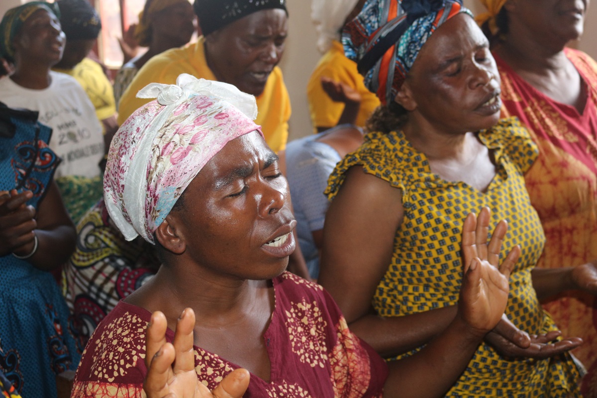Women pray during a worship service on Christian unity in Bukavu, Democratic Republic of Congo. The Church of Christ in Congo, an ecumenical Christian organization that includes United Methodists, sponsored the women’s event. Photo by Philippe Kituka Lolonga, UMNS.