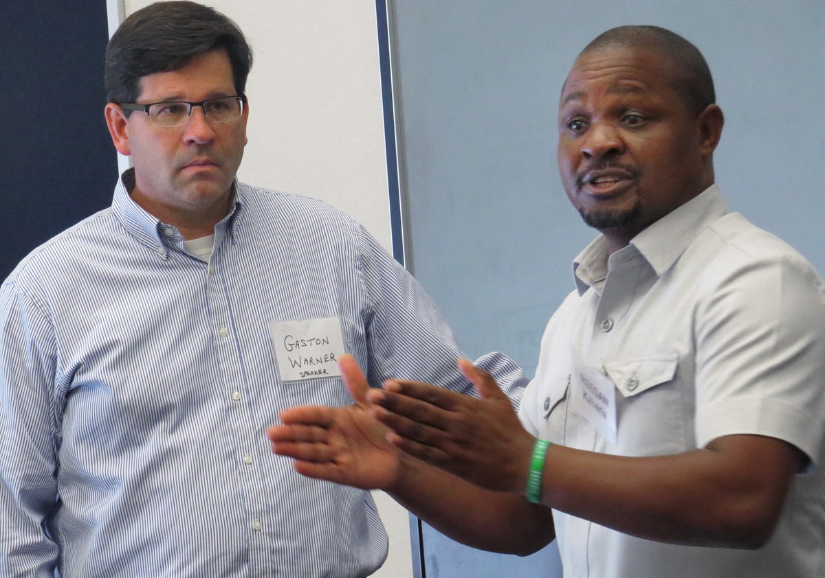 The Rev. Gaston Warner and Reegan Kaberia of the nonprofit ZOE, which works with orphans and other vulnerable children in Africa and India, lead a workshop at the Beyond These Walls mission conference at Chapelwood United Methodist Church in Houston. Photo by Sam Hodges, UMNS.