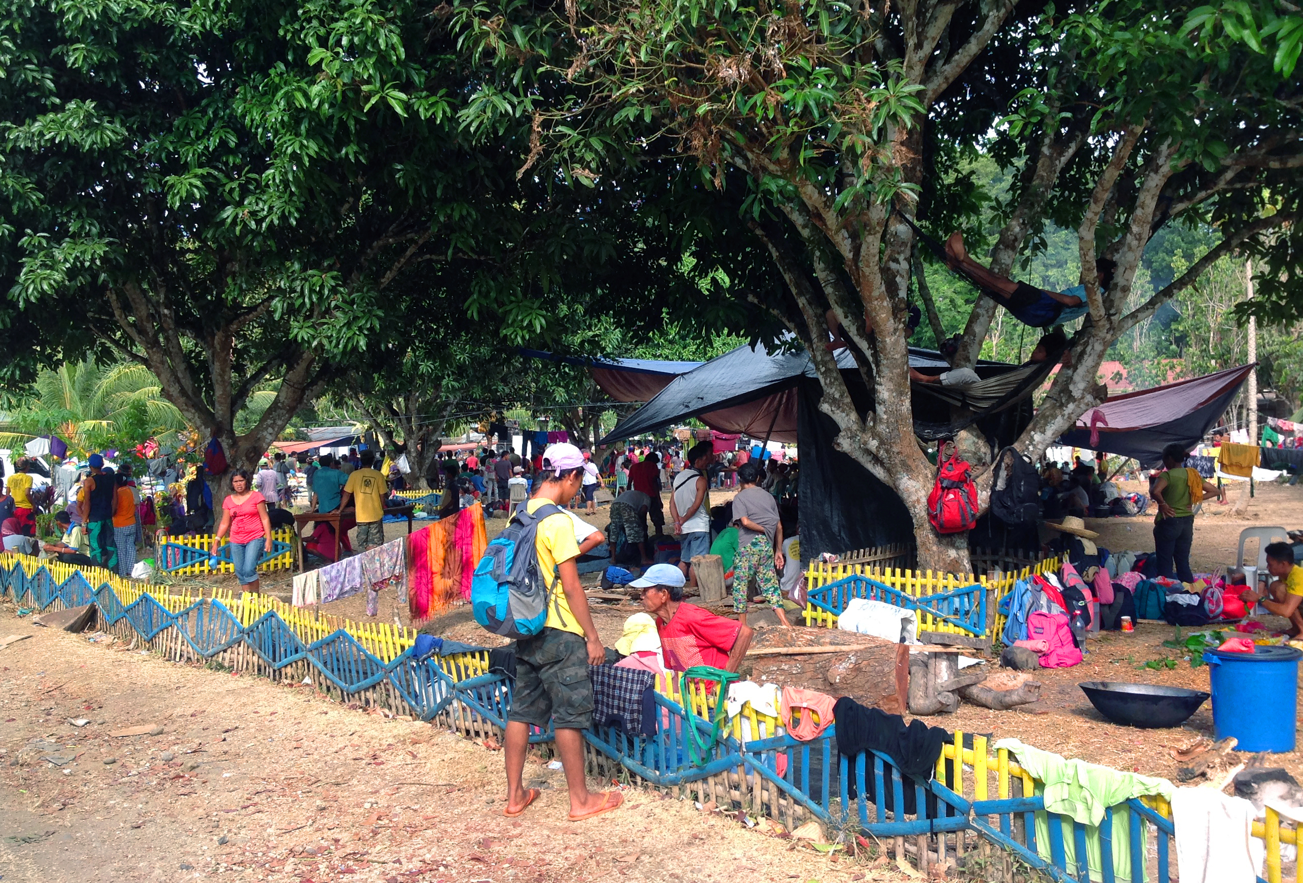 Thousands of farmers sought shelter at Spottswood Methodist Mission Center after government forces fired on their peaceful demonstration. Three were killed, 18 severely injured, close to a 100 wounded and scores missing. The center sheltered thousands of women, men and children for three days. Photo courtesy of United Methodist Bishop Ciriaco Q. Francisco.