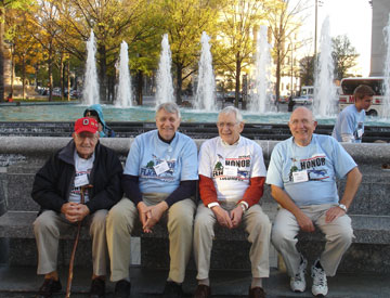 (From left) Ed Schellhaas, Gary Brand, Clancy Biegler, and Charles Barker, all members of Trinity United Methodist Church in Columbus, Ohio, traveled to Washington as part of Honor Flight. Photo by Jeff Fisher.