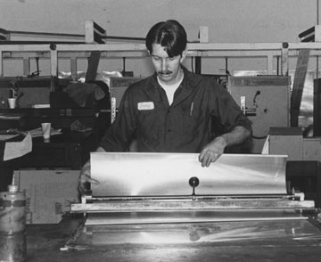 Danny Brown works the United Methodist Reporter press in the early 1990s.