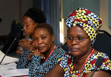 (From left) Mercy Nyirongo, Malawi; Hannah Mafunda, Zimbabwe; and Marie-Therese Nijimbere, Burundi, listen as experts in grant writing teach health board members the process.