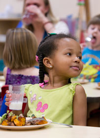 Zahra Ansari enjoys a healthy lunch at West End United Methodist Church's preschool in Nashville, Tenn. A UMNS photo by Mike DuBose.