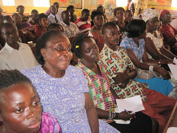Teachers at the training listen attentively.