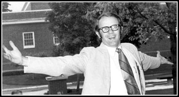 Author Rich Peck flashes his 