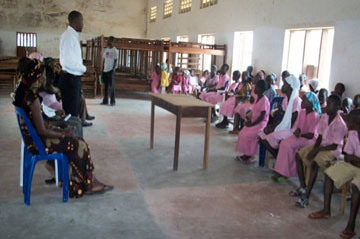 Students attend a session on reading skills and writing comprehension.