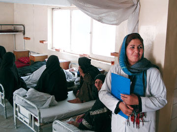 A nurse watches over patients at an eye hospital in Kabul, Afghanistan. Eye care is one of the health services that relief groups offer in Afghanistan. A UMNS file photo by David Wildman.