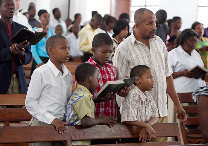 Parishioners sing a hymn during worship at College Bird Methodist Church in Port-au-Prince.