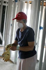Phyllis Fissel, 77, prepares to install insulation in a home in New Orleans. A UMNS photo by Kathy L. Gilbert.