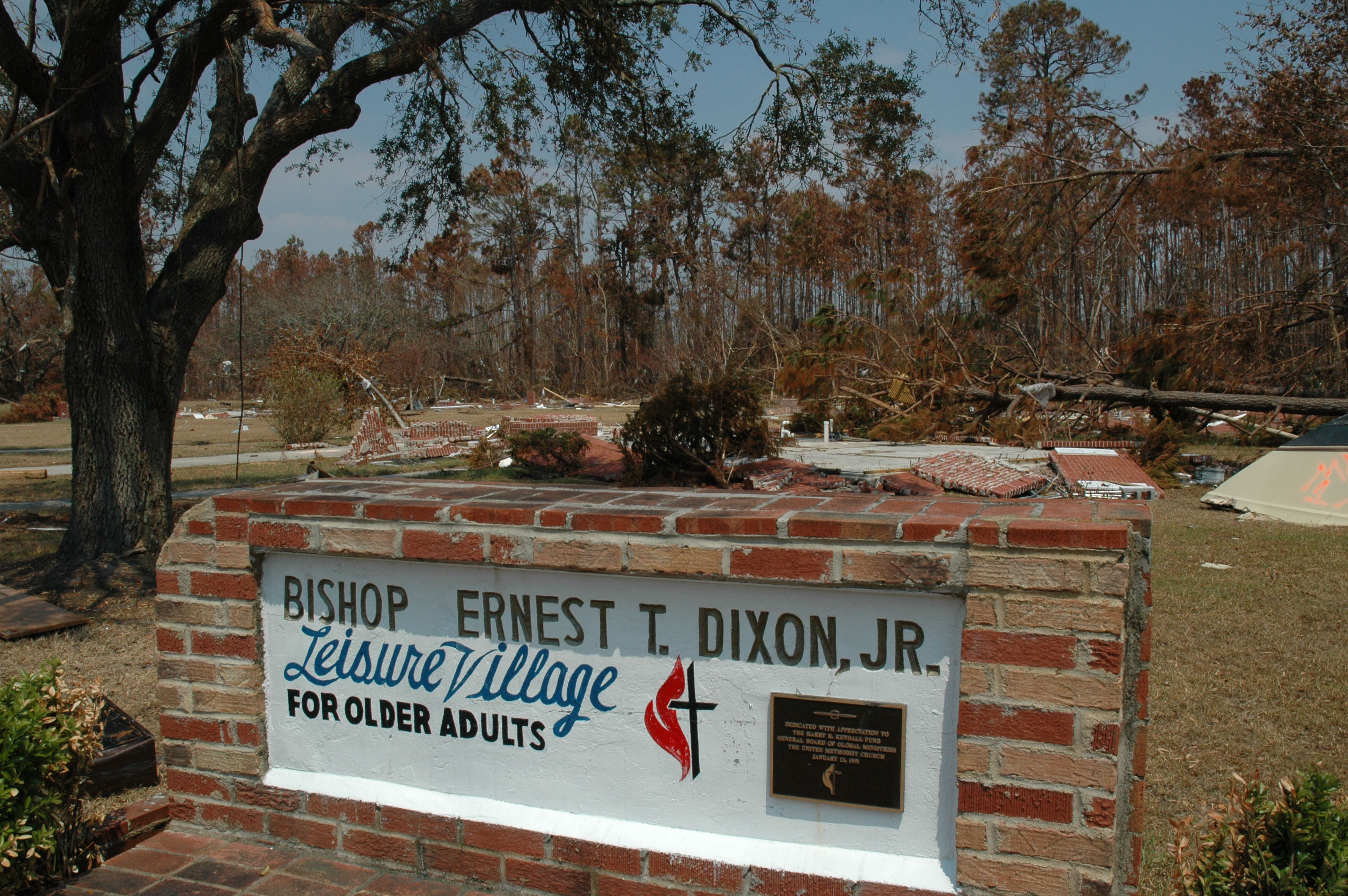While the cottages that made up Gulfside’s Ernest T. Dixon Leisure Village for Older Adults no longer exist, the sign remains unharmed. A UMNS photo by the Rev. Larry Hollon.