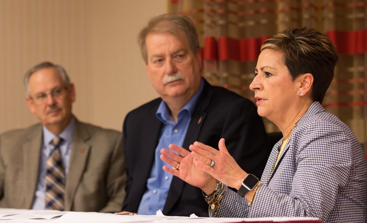 Bishop Kenneth H. Carter Jr. (middle) and Bishop Bruce R. Ough listen to Bishop Cynthia F. Harvey during a May 4 press conference after the Council of Bishops recommended the One Church Plan to help The United Methodist Church stay unified despite division over how to minister with LGBTQ persons. The council issued a May 18 press release clarifying its recommendation. Photo by Mike DuBose, UMNS.