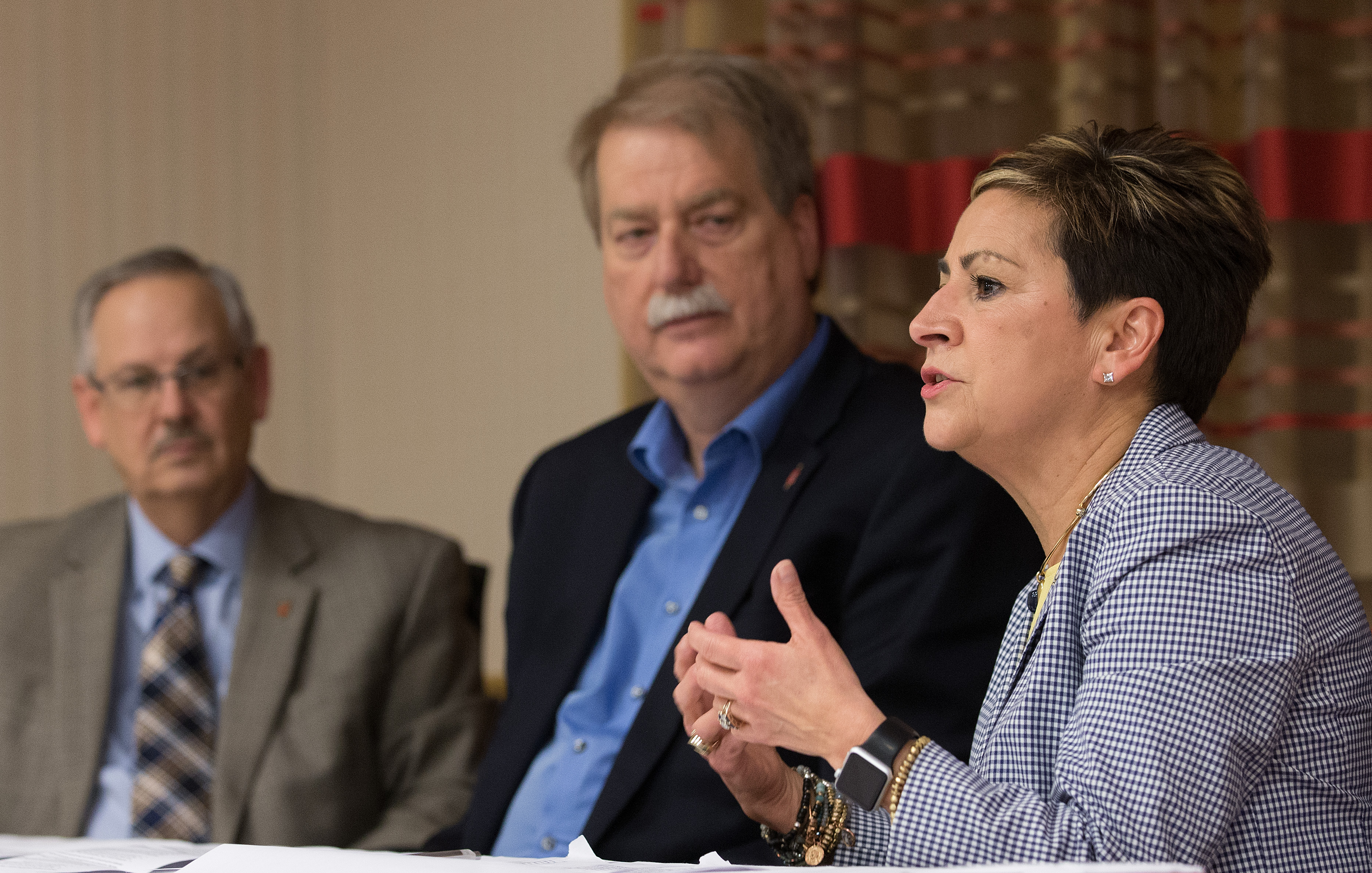 Bishop Cynthia F. Harvey (right) answers questions during a press conference about The United Methodist Church's Way Forward plan to address how the denomination ministers with LGBTQ individuals. She is flanked by Bishops Bruce R. Ough (left) and Kenneth H. Carter following the Council of Bishops meeting in Chicago. Photo by Mike DuBose, UMNS.