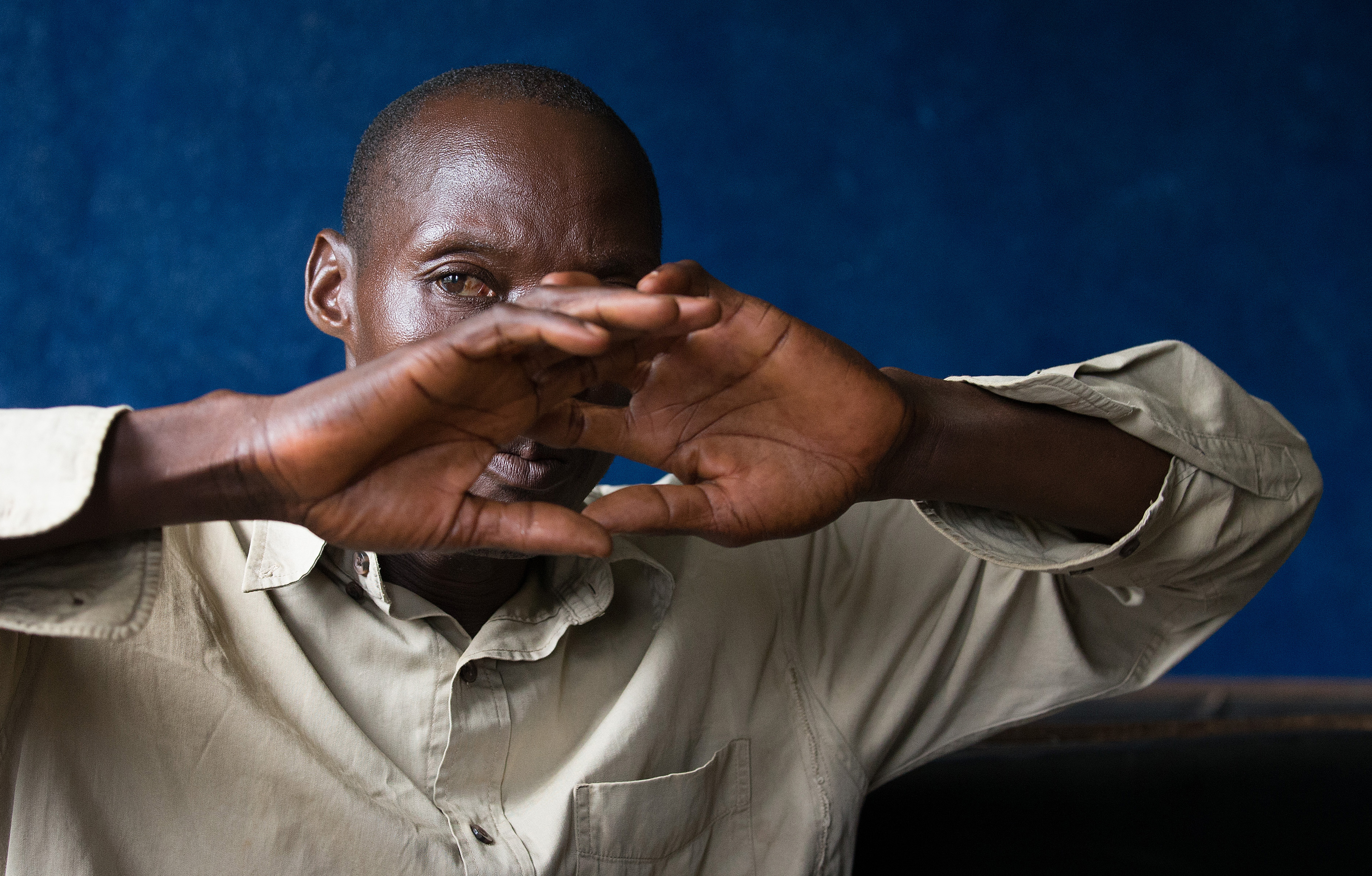Ernest Tokpah recalls the toll Ebola took on his family during 2015 and 2016 in Ganta, Liberia. "Ganta was on fire because of the Ebola," he said. "We stopped eating together, we stopped shaking hands, and people practically stopped talking to each other.” Tokpah, a faculty member at Ganta United Methodist School, is raising four children left orphaned when his sister and her husband died of the disease. Photo by Mike DuBose, UMNS.