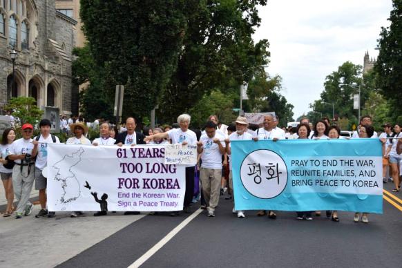 A peace committee shouting "End armistice!” and “Peace treaty now!" marches from Foundry United Methodist Church to the White House in Washington during a rally on July 27, 2014. Korean-American United Methodists are hopeful as the United States and North Korea prepare for a possible summit in June. A peace committee shouting "End armistice!” and “Peace treaty now!" marches from Foundry United Methodist Church to the White House in Washington during a rally on July 27, 2014. Korean-American United Methodists are hopeful as the United States and North Korea prepare for a possible summit in June.