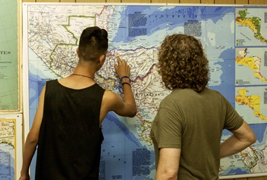 Unaccompanied minor migrants enjoy four days at a United Methodist summer camp. They point out their home towns and trace the journey they took to arrive at U.S. border on a large wall map. Photo courtesy of California-Pacific Conference. Unaccompanied minor migrants enjoy four days at a United Methodist summer camp. They point out their home towns and trace the journey they took to arrive at U.S. border on a large wall map. Photo courtesy of California-Pacific Conference.