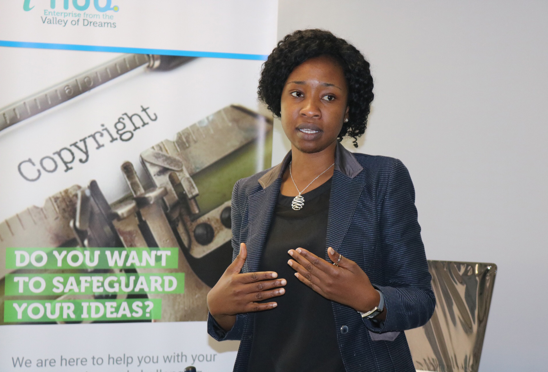 Yollanda Washaya, innovation hub manager for Africa University, works to implement new ideas such as building a biogas digester to recycle waste, operating a 3D printer to create prototypes, and branding. Photo by Eveline Chikwanah, UMNS. 