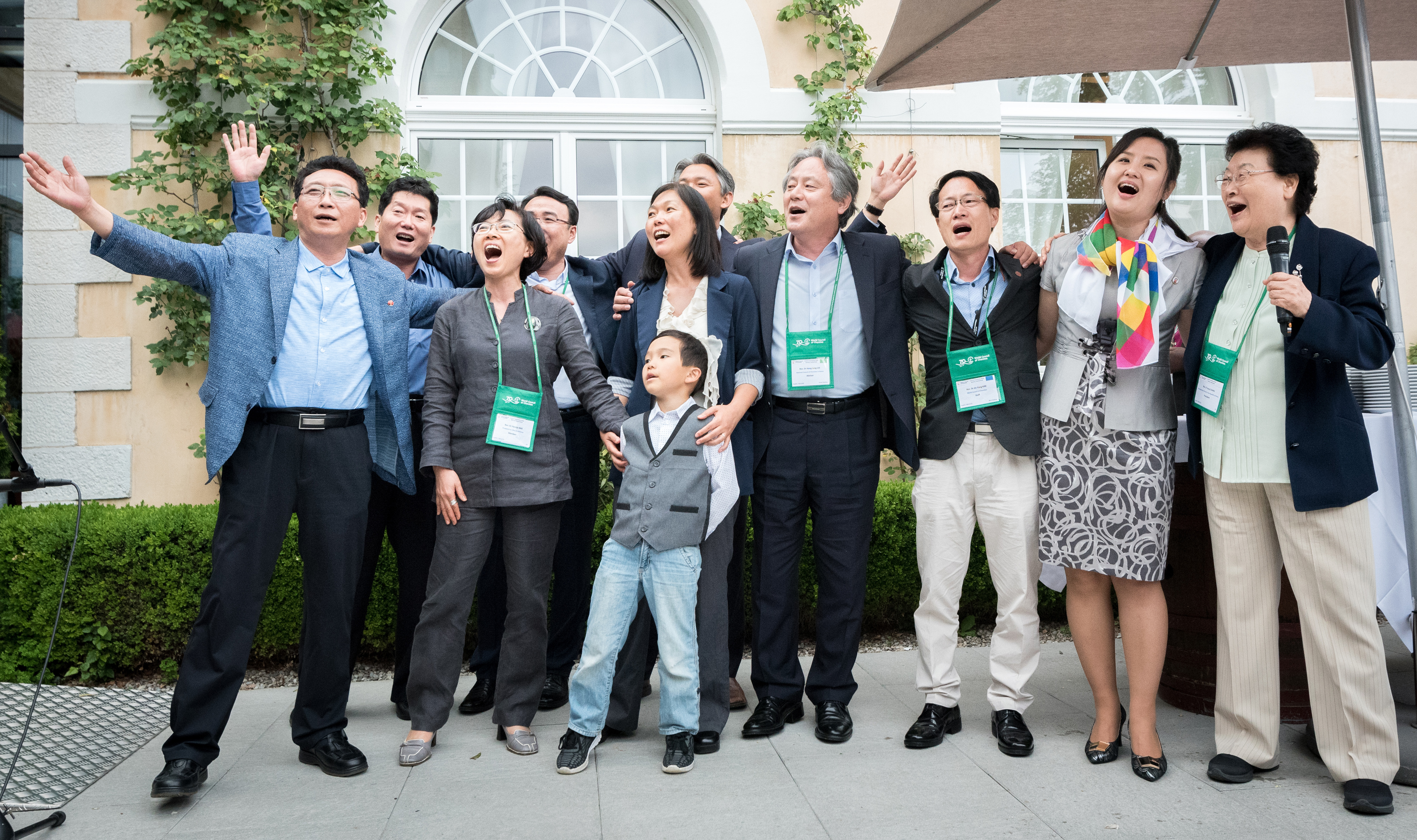 Koreans from both North and South Korean and American Koreans join together in singing a  600 year old Korean folk song about love and reuniting during events of the World Council of  Churches. Photo by Albin Hillert, WCC.