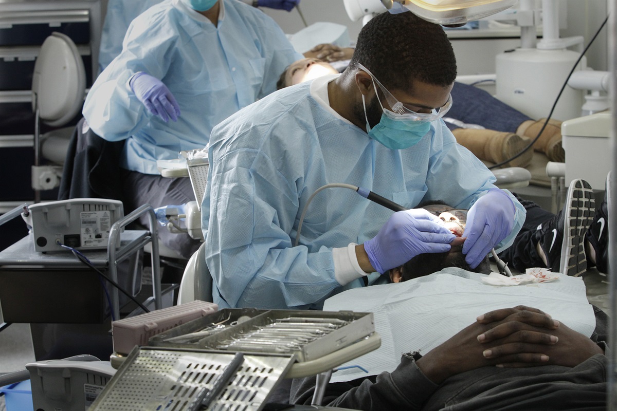 Student dentist Preston Harris sees a patient in the Meharry Medical College mobile dental clinic in Nashville, Tenn. Photo courtesy of Meharry Medical College. Student dentist Preston Harris sees a patient in the Meharry Medical College mobile dental clinic in Nashville, Tenn. Photo courtesy of Meharry Medical College.