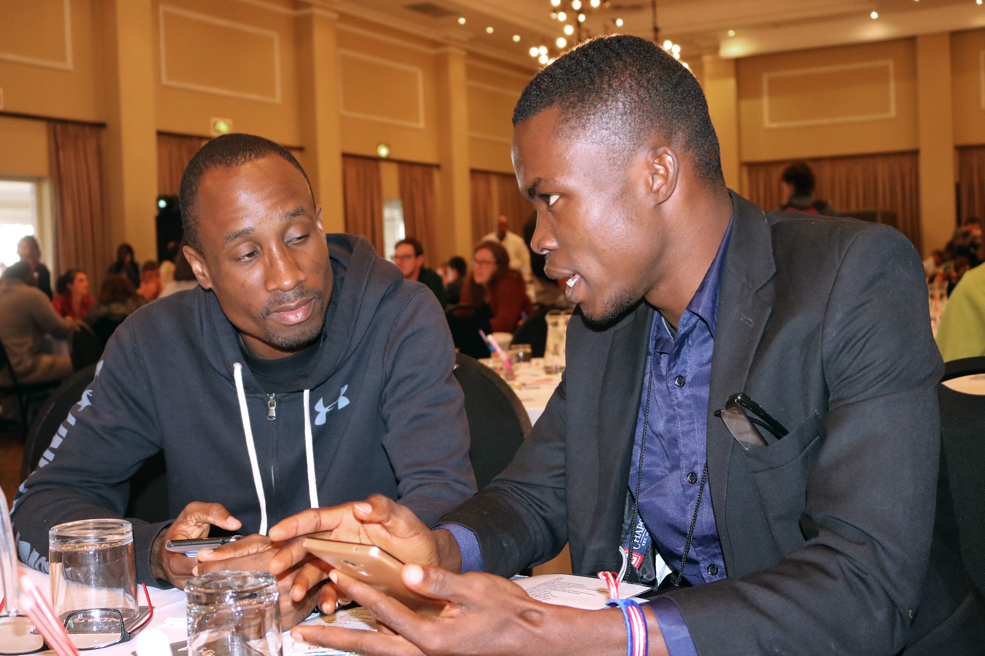 Landry Seki of Côte D’Ivoire (left) and Bill N. Gaye of Liberia visit at the United Methodist Global Young People’s Convocation in Johannesburg, South Africa. Photo by Eveline Chikwanah.