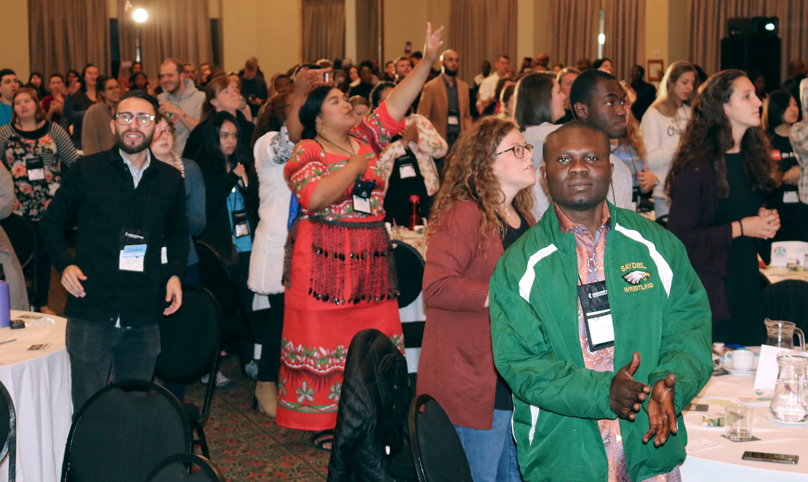 Delegates sing during worship at the Global Young People’s Convocation. The gathering brings together young United Methodists from 40 countries to discuss issues affecting young people and unity in the church. Photo by Eveline Chikwanah.