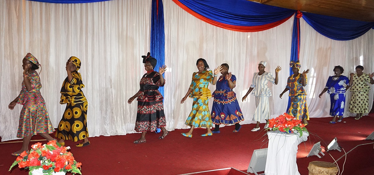 United Methodist Women model clothing they sewed using skills they learned in a conference-led garment-making workshop. Photo by Kudzai Chingwe.
