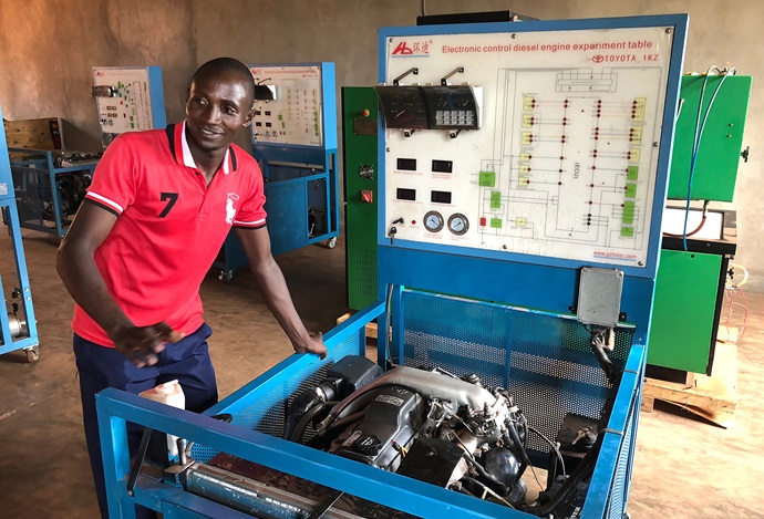 Alexis Karenzi, a young adult in the Rwanda Provisional Conference, is studying auto mechanics with a grant from the Center for Health and Hope. The Rev. Tom Owens raised funds for the grant with a marathon up Pikes Peak. Photo by Donald E. Messer. 