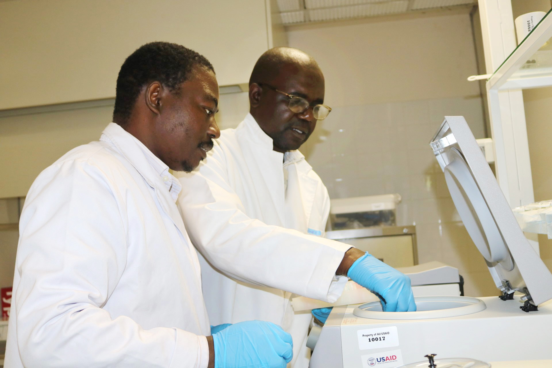 Nobert Mudare and Aramu Makuwaza work in the malaria research laboratory at Africa University. Photo by Eveline Chikwanah, UMNS. 