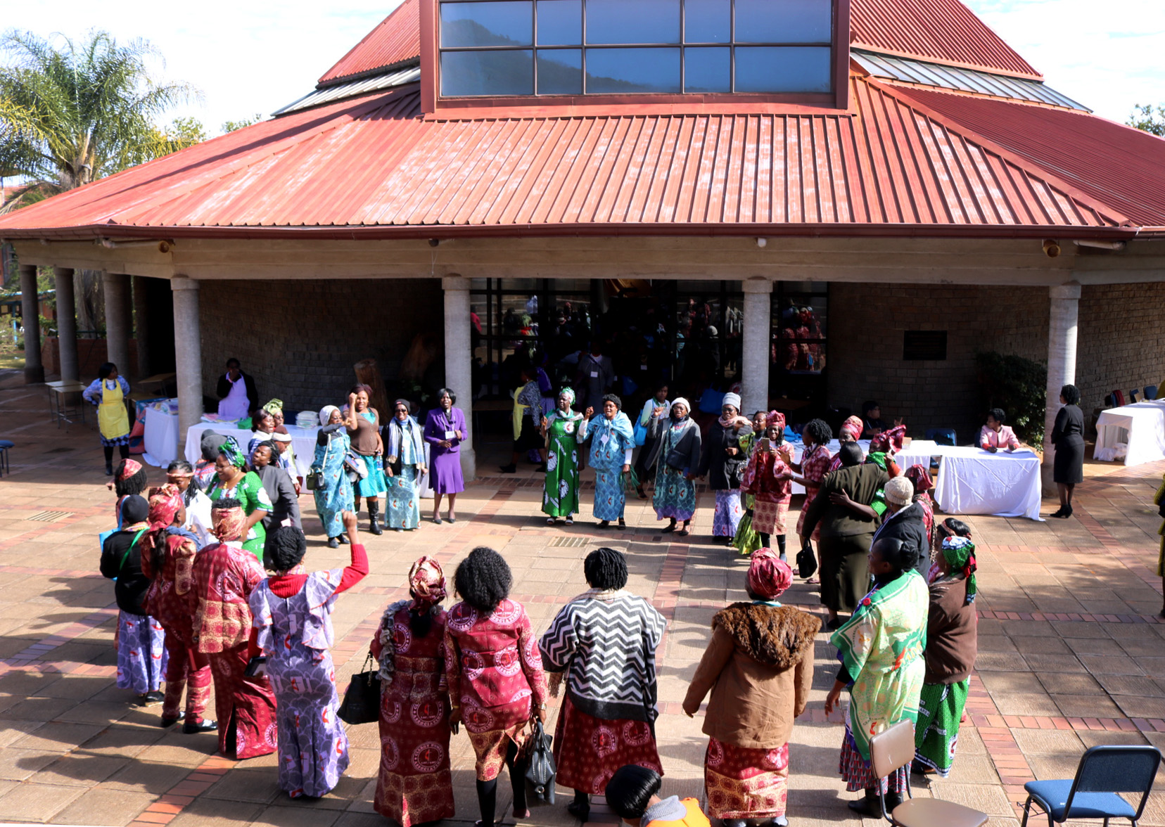 Clergywomen gather in fellowship outside the Kwang Lim Chapel at African University in Mutare, Zimbabwe, during the July 10-14, 2018, African United Methodist Clergywomen Leadership Development Conference. Photo by Eveline Chikwanah, UMNS.