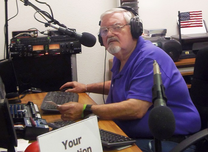 Tom Kinkead is a certified lay minister at Alamo United Methodist Church, but he's also station manager and morning disc jockey for its low power FM radio station, KPPC. Photo by Cheryl Megosh.