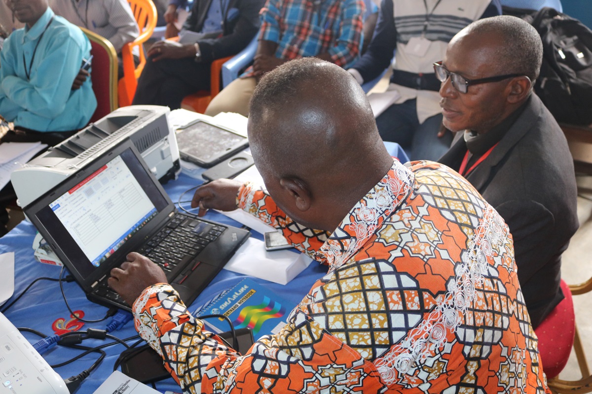 The Rev. Henry Jean Robert Kasongo Numbize works on a laptop during computer training provided by the Kivu Conference in Bukavu, Congo. Photo by Philippe Kituka Lolonga, UMNS
