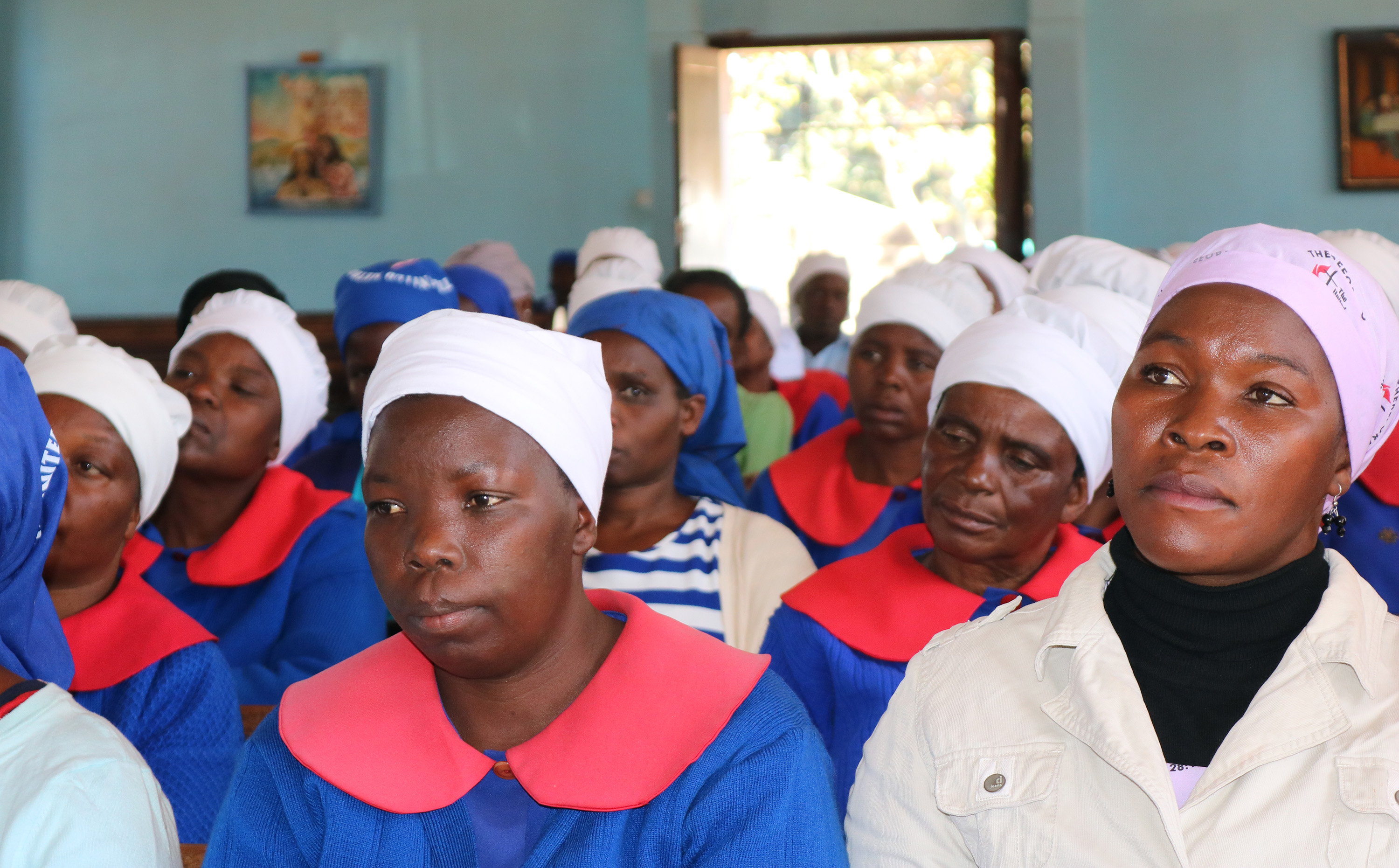 Women listen to a presentation on inheritance at St. Timothy United Methodist Church in Harare, Zimbabwe. The United Methodist Church is helping women protect their inheritance rights through awareness programs and legal advice. Photo by Priscilla Muzerengwa, UMNS.
