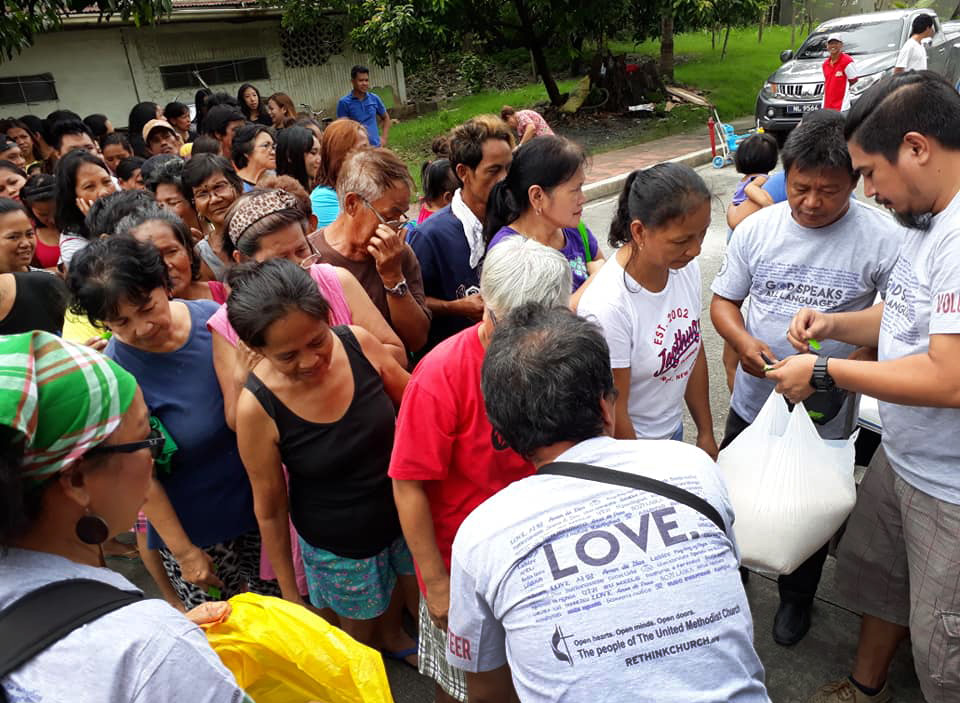 A United Methodist team led by Liza Cortez assisted the victims of August monsoon flooding in Marikina City, Philippines.  Each family was given a pail holding 10 kilos of rice, dried fish, mongo, cooking oil, sardines and a pack of biscuits. Photo courtesy of Liza Cortez.
