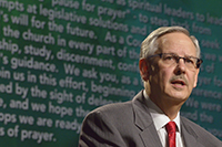 Bishop Bruce R. Ough reads a statement about sexuality and the church from the denomination's Council of Bishops on May 18 at the 2016 United Methodist General Conference in Portland, Ore. Photo by Paul Jeffrey, UMNS.