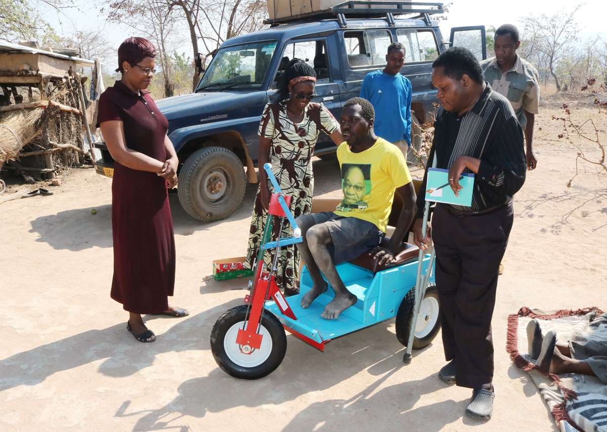 Givemore Matingarare tests out one of the wheelchairs distributed by Raphael Bareyi. Bareyi has distributed over 100 wheelchairs throughout Zimbabwe. Photo by Chenayi Kumuterera, UMNS