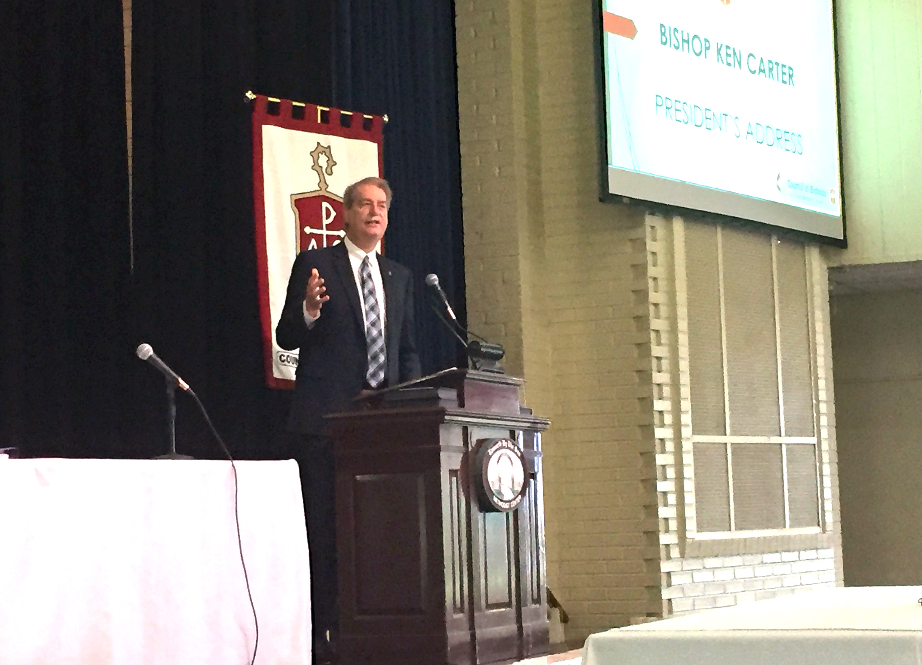 Bishop Kenneth H. Carter Jr. delivers his first address to his episcopal colleagues as Council of Bishops president. At a time of stress in the church, the bishops meet at United Methodist retreat center Epworth by the Sea on St. Simons Island, Ga. Photo by Heather Hahn, UMNS.