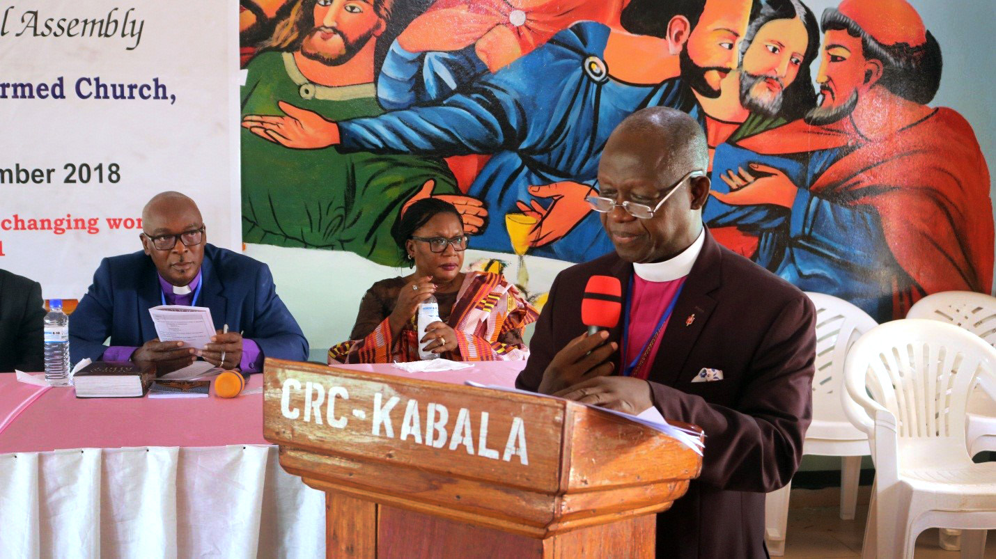 Bishop John K. Yambasu, president of the Council of Churches in Sierra Leone, delivers his presidential address in Kabala, Sierra Leone, in September. He said the church has engaged in research and dialogue to minimize the practice of female genital mutilation. Photo by Keziah Kargbo.