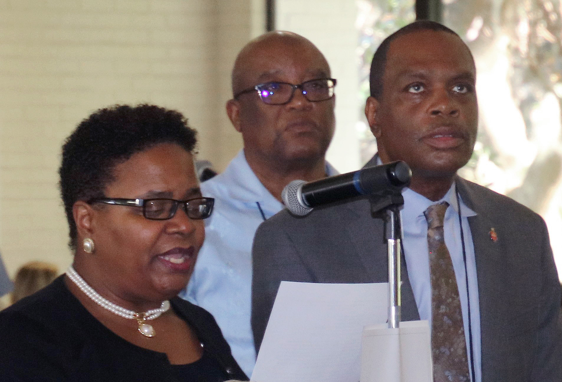 Bishops LaTrelle Easterling and Leonard Fairley present a statement that deplores the surge in racism in the U.S. Bishop W. Earl Bledsoe looks on. Photo by the Rev. Maidstone Mulenga, Council of Bishops.